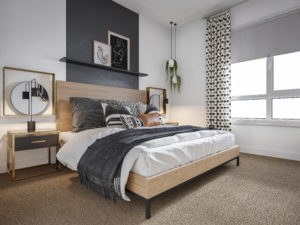 furnished bedroom at Alexan Julian - Warm and Inviting Denver Apartments